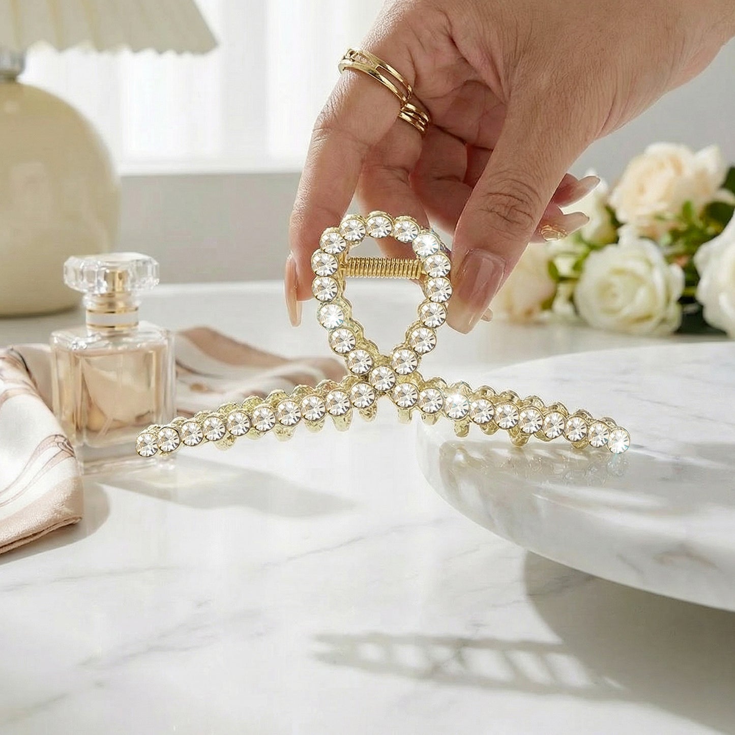 Pince Bijou Accent Doré à Boucle Cristal