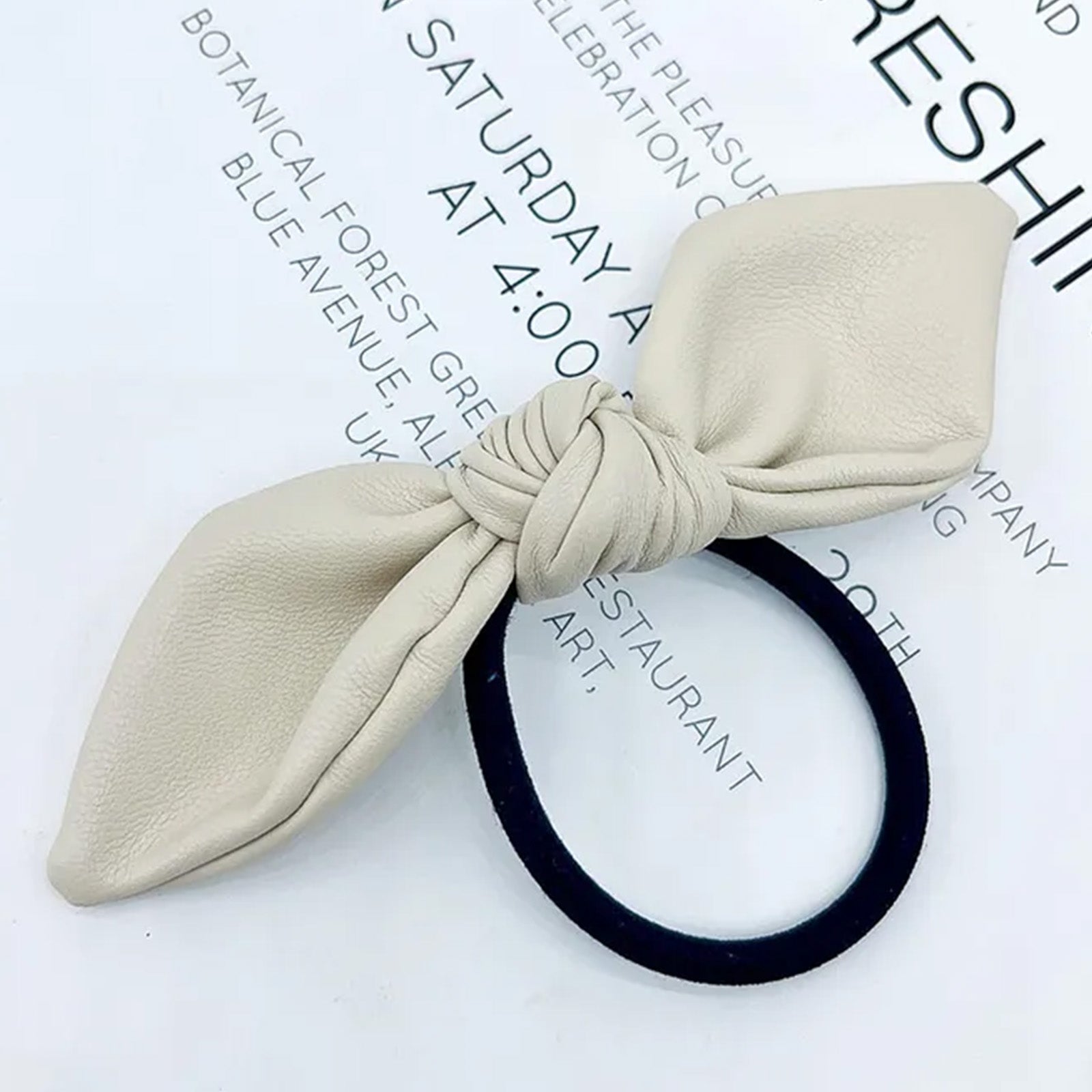 Élastique Casual Louisa à Nœud Papillon en Cuir Beige