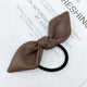 Élastique Casual Louisa à Nœud Papillon en Cuir Marron