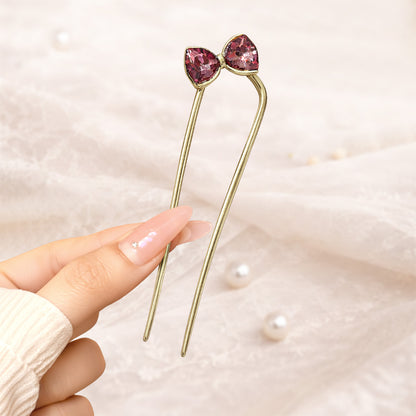 Épingle à Chignon Dorée Ruban Cristal à Nœud Raffiné