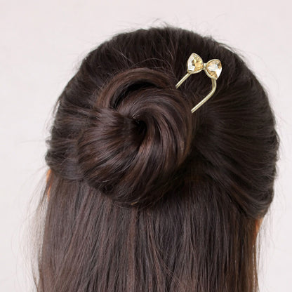 Épingle à Chignon Argentée Ruban Cristal à Nœud Raffiné
