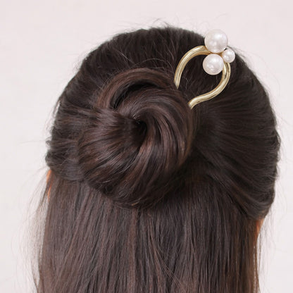 Épingle à Chignon Dorée Design Ondulé avec Perles Nacrées