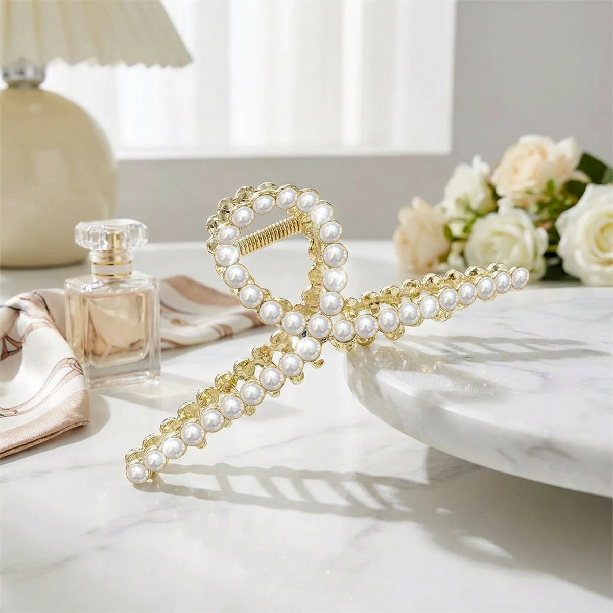 Pince Bijou Clarté Douce à Boucle Ornée de Perles