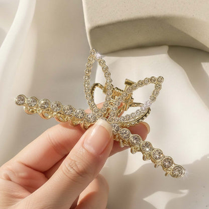 Pince Bijou Doré Accent Cristallin à Motif Pétales Strassées