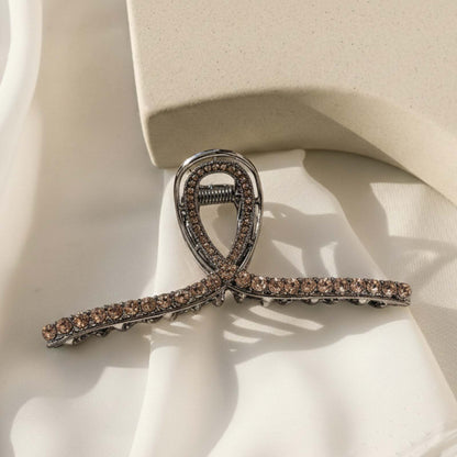 Pince Bijou Éclat Fumé à Boucle Ruban Cristallin