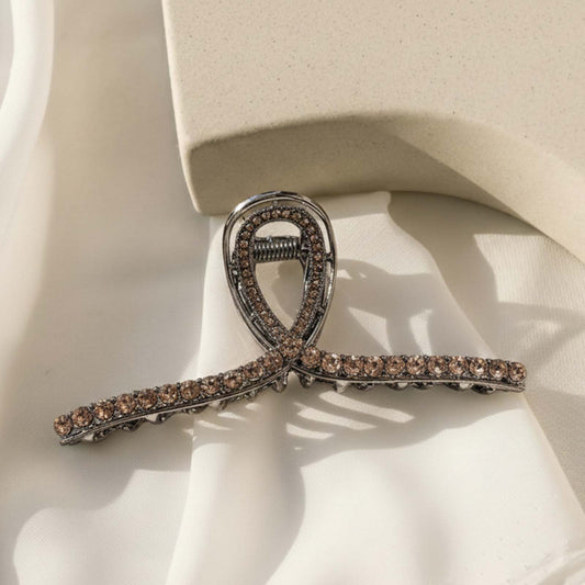 Pince Bijou Éclat Fumé à Boucle Ruban Cristallin