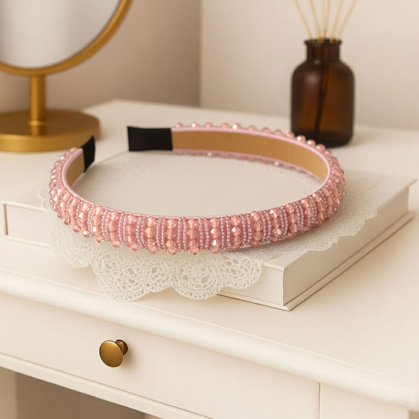Serre-tête rose poudré élégant en cristaux décoratifs