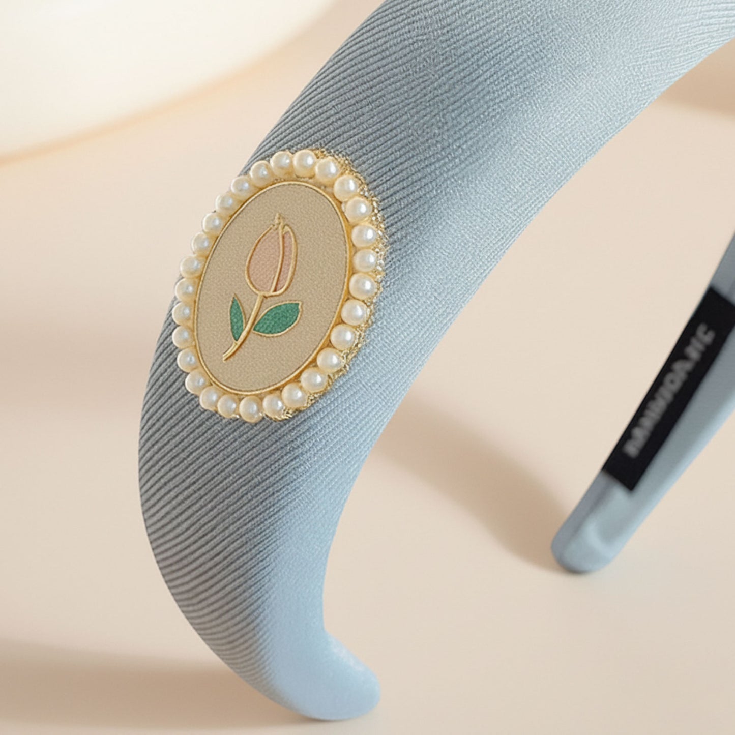 Serre tête satin bleu clair avec médaillon floral tulipe