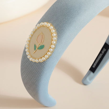 Serre tête satin bleu clair avec médaillon floral tulipe